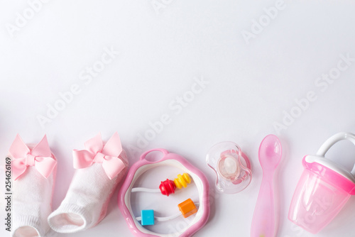 Flat lay composition with baby accessories and space for text on white background