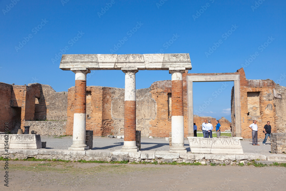 The city of Pompeii buried under a layer of ash by the volcano Mount Vesuvius The city of Pompeii buried under a layer of ash by the volcano Mount Vesuvius