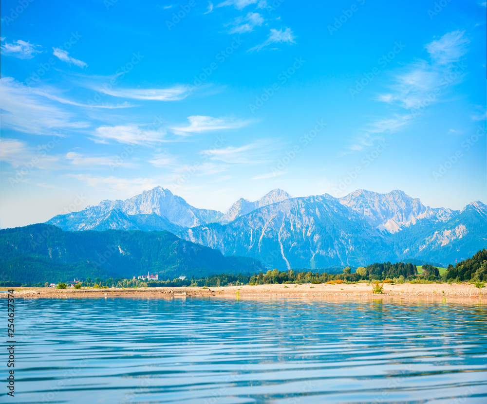 Amazing summer landscape with clear mountain lake in the Alps