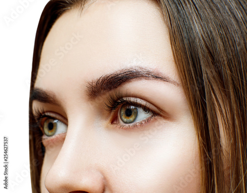 Young woman with extended eyelashes.