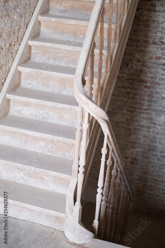 Bilde på lerret sandblasted wooden staircase during renovation in an old house