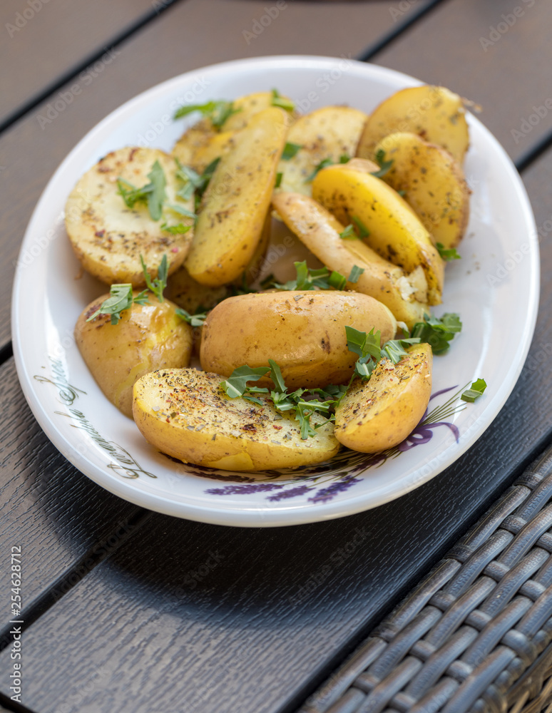 potatoes with herbs sprinkled with green parsley potatoes with herbs sprinkled with green parsley