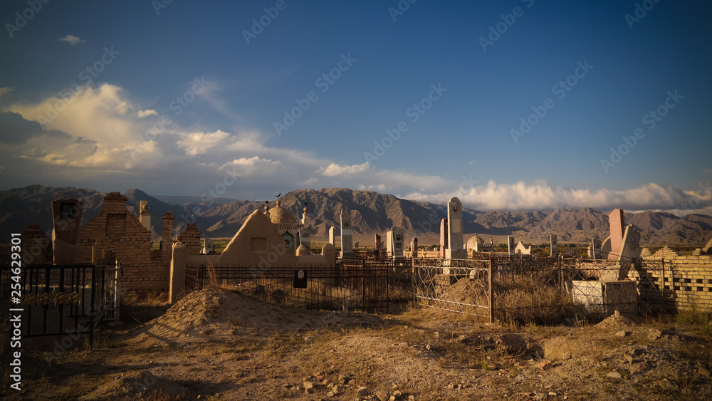 Panorama view to muslim cemetery Semiz Bel at Kochkor in Naryn, Kyrgyzstan Panorama view to muslim cemetery Semiz Bel at Kochkor in Naryn, Kyrgyzstan