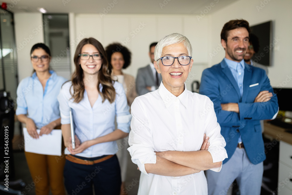 Group of successful business people in office Group of successful business people in office