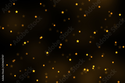 Gold stars bokeh overlay, stars photo overlay, abstract background, shiny gold and yellow stars flowing around. Photo overlay effect, stars bokeh on black background, JPG file.
