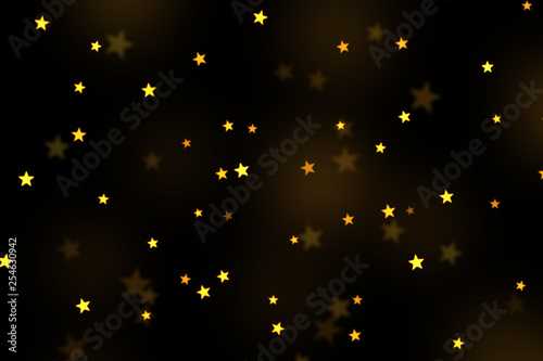 Gold stars bokeh overlay, stars photo overlay, abstract background, shiny gold and yellow stars flowing around. Photo overlay effect, stars bokeh on black background, JPG file.