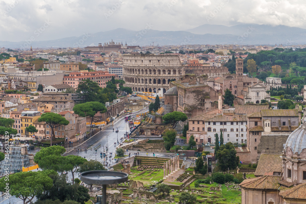 Panoramic view on Rome historic center - Imperial Forum and Colosseum from the median terrace of the Other of the Homeland