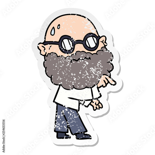 distressed sticker of a cartoon worried man with beard and spectacles pointing finger