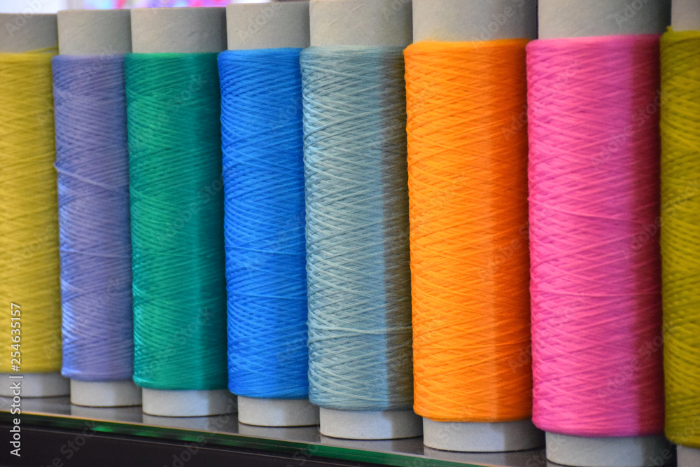 Large colorful polypropylene thread set in rainbow mood. Multicolor bobbin thread. Polypropylene multifilament yarns. Set of sewing thread coils, miscellaneous colours. Large colorful polypropylene thread set in rainbow mood. Multicolor bobbin thread. Polypropylene multifilament yarns. Set of sewing thread coils, miscellaneous colours.