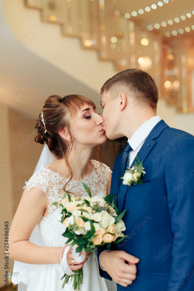 newlyweds in the apartment, a beautiful bride and groom in the rich interior 1 newlyweds in the apartment, a beautiful bride and groom in the rich interior 1