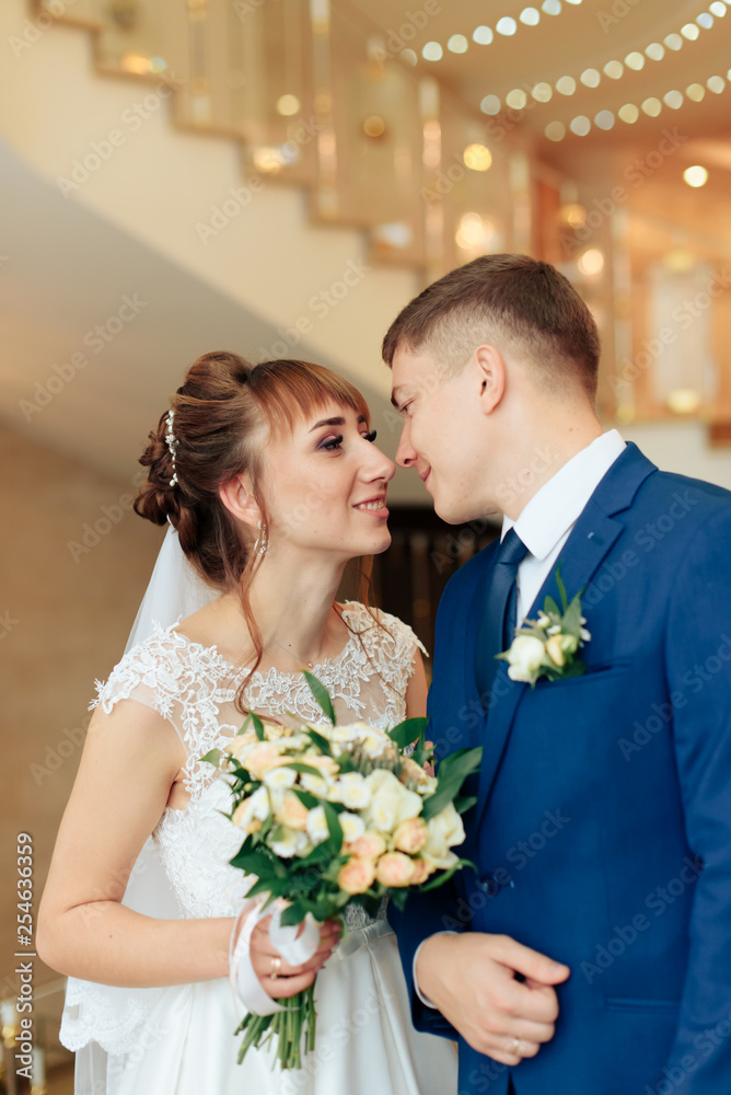 newlyweds in the apartment, a beautiful bride and groom in the rich interior 1 newlyweds in the apartment, a beautiful bride and groom in the rich interior 1