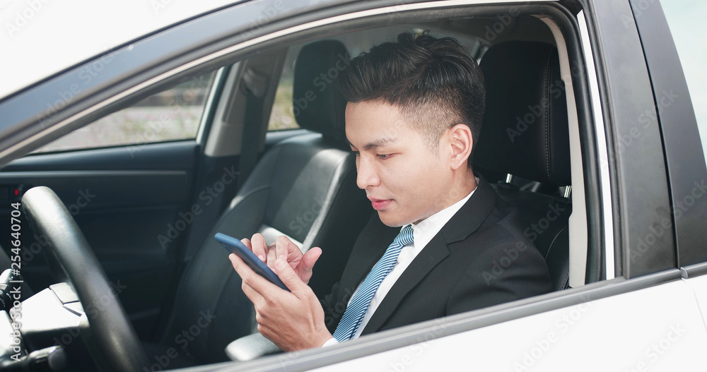 man use phone in car