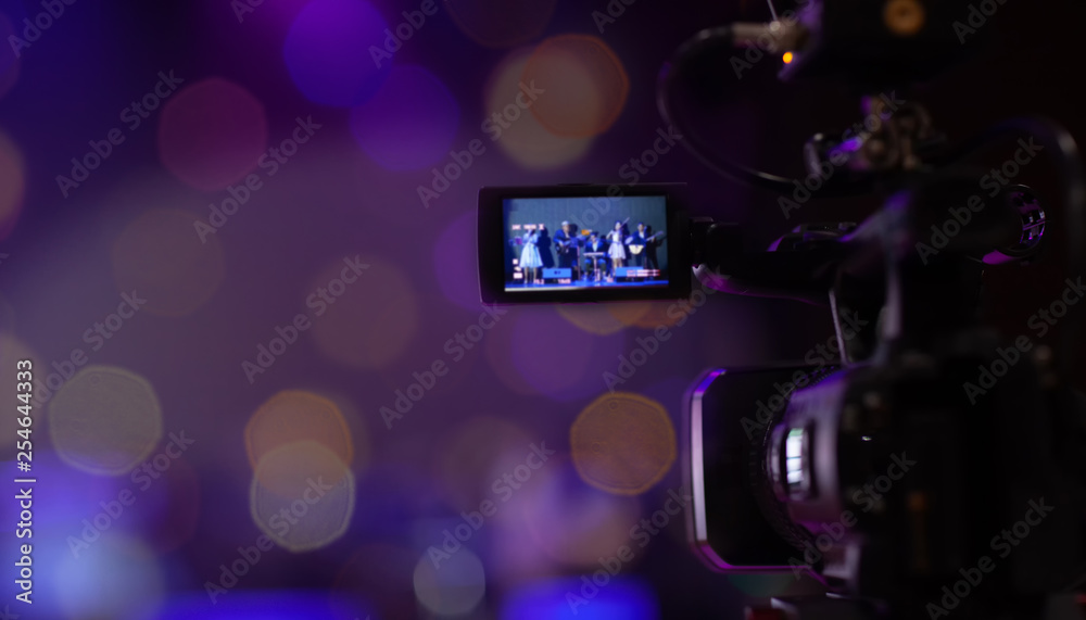 Soft and Blur focus camera show viewfinder image catch motion in interview or broadcast wedding ceremony, Video Cinema From camera. video cinema production on Bokeh background Soft and Blur focus camera show viewfinder image catch motion in interview or broadcast wedding ceremony, Video Cinema From camera. video cinema production on Bokeh background