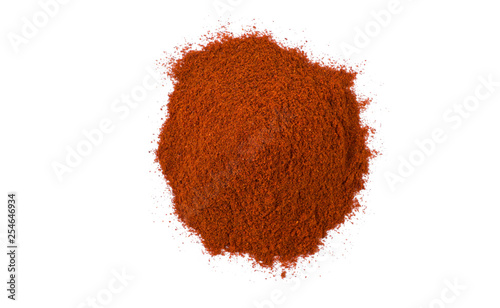 milled or ground paprika or red pepper heap isolated on white background. top view