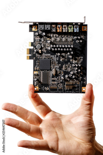 PCI Express card for computer in hand, audio chip photo