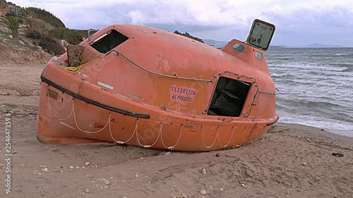 Empty lifeboat after accident in the sea.