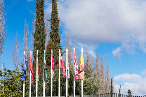 masts with flags from different places