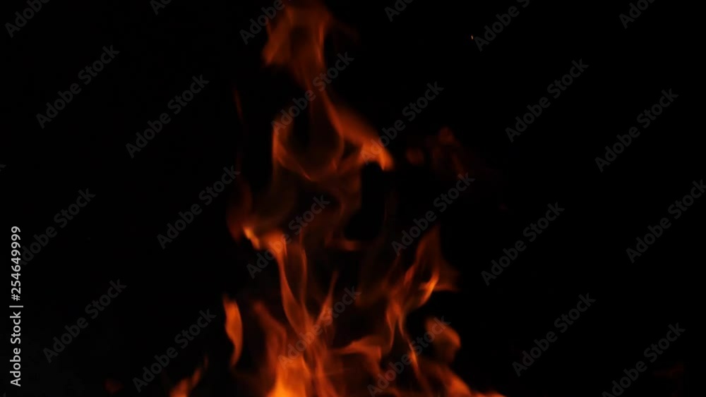 Close-up of burning fire, flames burning on black background, slow motion, 4k. Close-up of burning fire, flames burning on black background, slow motion, 4k.