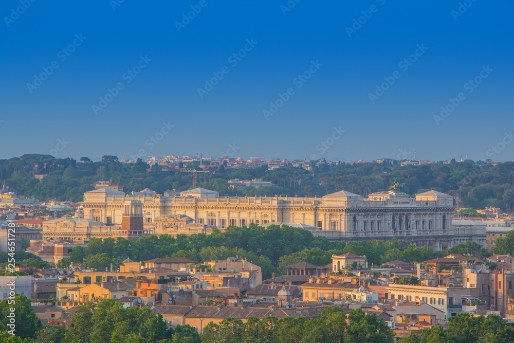 Top view of Supreme Court of Cassation in Rome (Italian: Corte Suprema di Cassazione). Beautiful view of building roman Court of Cassation, sunny evening. Aerial panoramic cityscape of Rome, Italy.