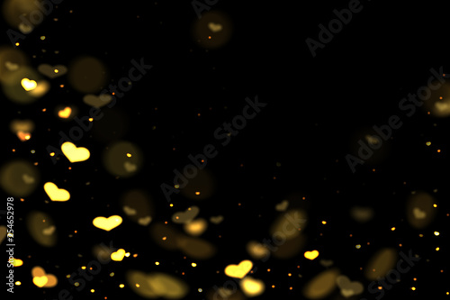 Gold and yellow hearts bokeh overlay  hearts photo overlay  abstract background  shiny gold and yellow hearts flowing around. Photo overlay effect  hearts bokeh on black background  JPG file.