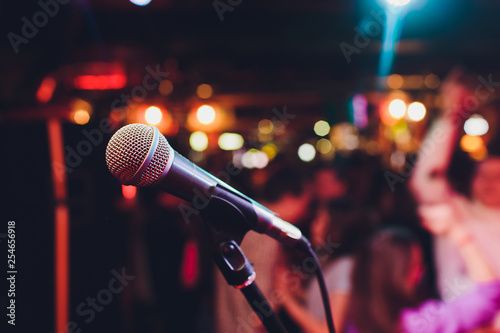 microphone against blur on beverage in pub and restaurant background.