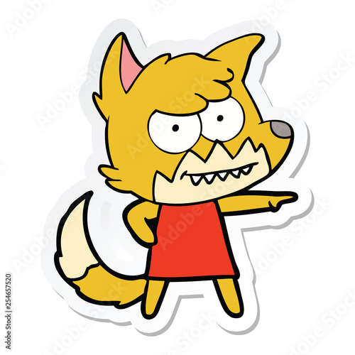 sticker of a cartoon grinning fox
