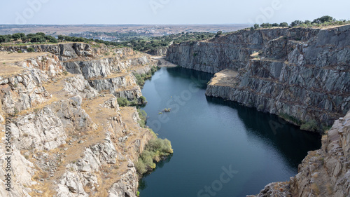 quarry open at Alcántara (Spain) with a small beach for swimming