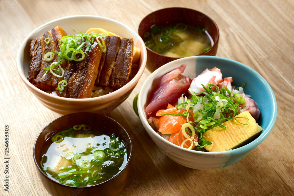 Rice bowl in Japanese style serve with egg roll soup. Rice bowl in Japanese style serve with egg roll soup.