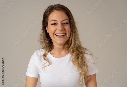 Human expressions and emotions. Close up of young attractive cheerful woman with smiling happy face