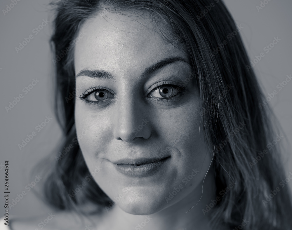 Human expressions and emotions. Portrait of young attractive woman with smiling happy face Human expressions and emotions. Portrait of young attractive woman with smiling happy face
