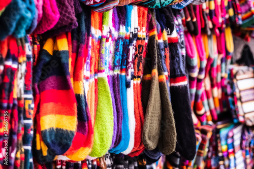 Different colorful hanging socks with weaves