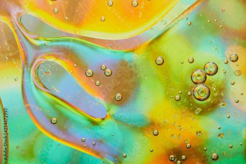 abstract background of colored drops of water and oil