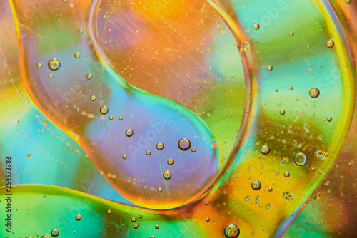 abstract background of stains and paint bubbles in liquid