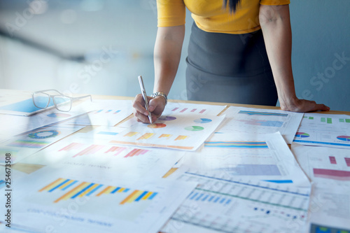 close up of a businesswoman looking at accounting data on her desk
