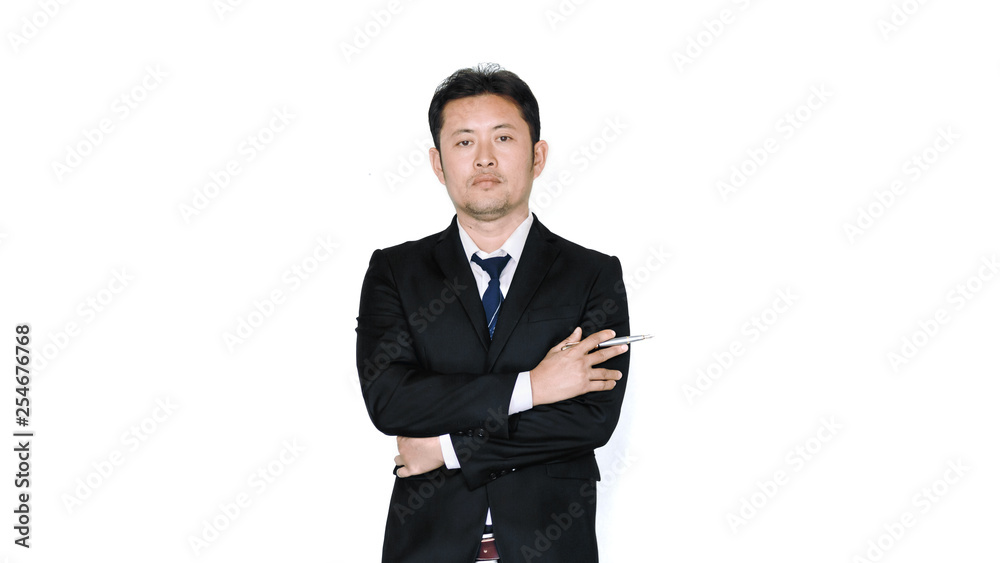 businessman in suit holding pen over white background businessman in suit holding pen over white background