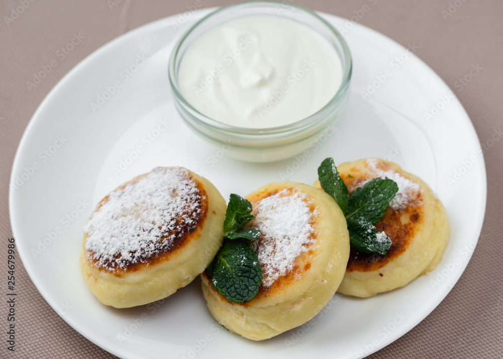 pancakes with powdered sugar and sour cream pancakes with powdered sugar and sour cream
