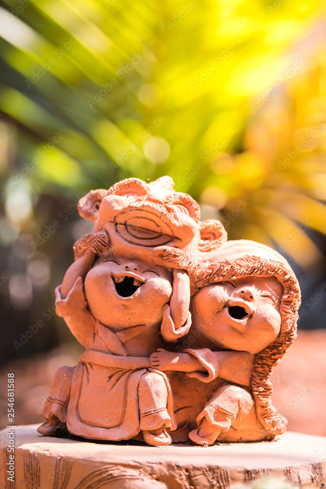 Fototapeta premium Clay doll boy was lion dance