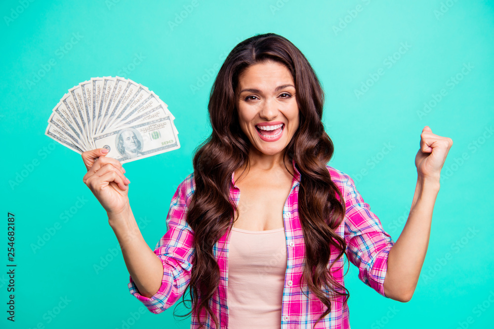 Close up photo beautiful she her lady hands arms hold fan bucks money look glad scream shout yell wear casual plaid checkered pink shirt outfit isolated teal bright vivid background Close up photo beautiful she her lady hands arms hold fan bucks money look glad scream shout yell wear casual plaid checkered pink shirt outfit isolated teal bright vivid background