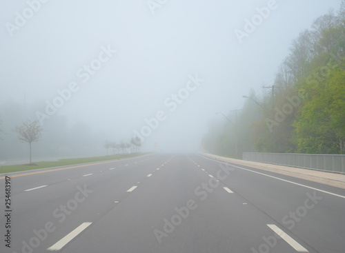 Big road and morning fog 