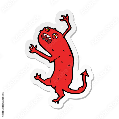 sticker of a cartoon little monster