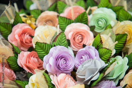 A coffin with a flower arrangement in a morgue