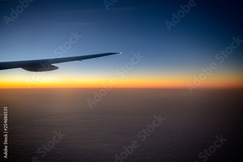 Beautiful sky in evening from window airplane