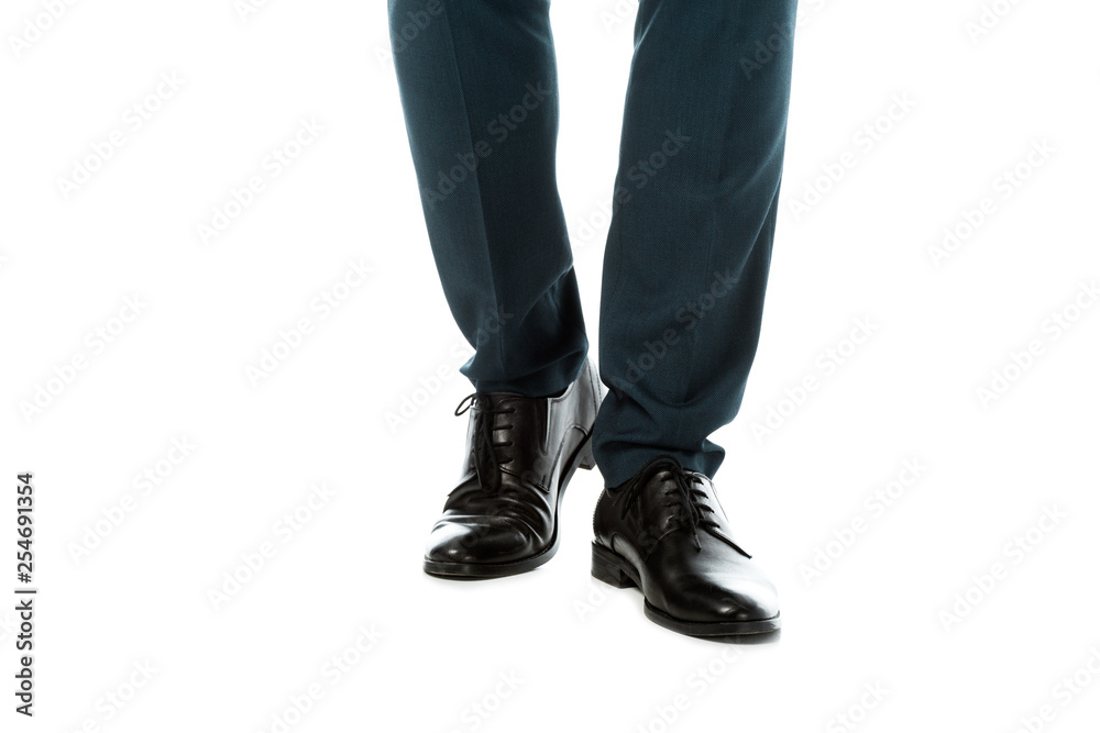 cropped view of man in black classic elegant shoes isolated on white cropped view of man in black classic elegant shoes isolated on white
