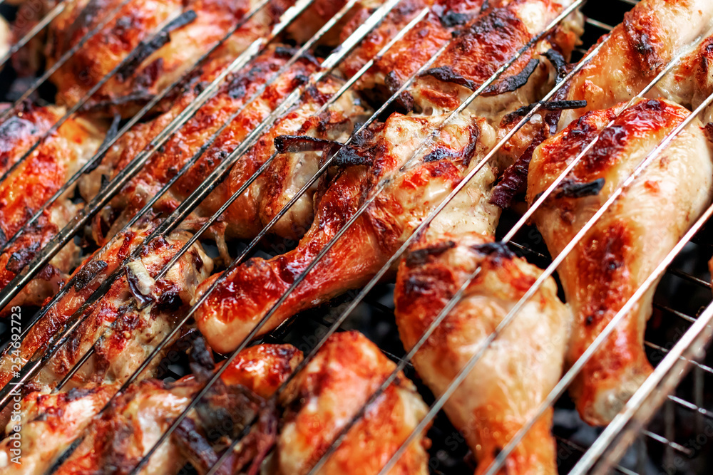 Grilled chicken steak on barbecue grill. Grilled chicken steak on barbecue grill.