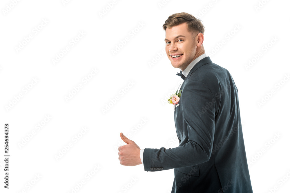 handsome smiling bridegroom showing thumb up isolated on white handsome smiling bridegroom showing thumb up isolated on white