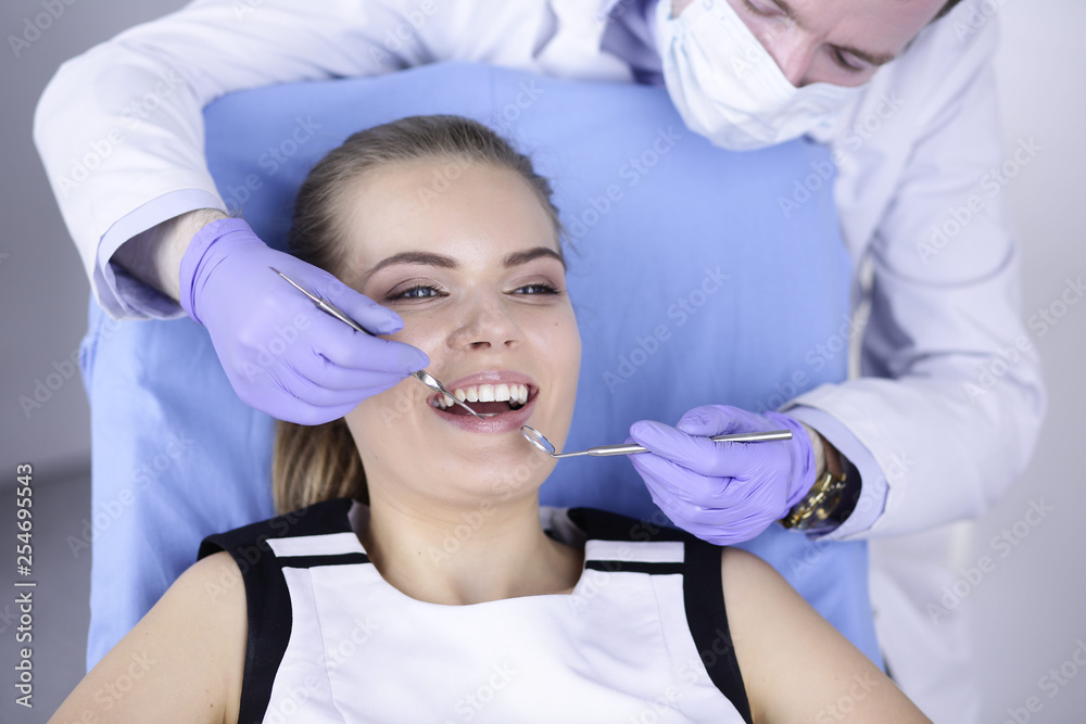 beautiful girl in the dental chair on the examination at the dentist beautiful girl in the dental chair on the examination at the dentist