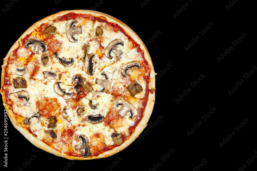 Fresh pizza with meat beaf chicken pork, tomatoes, vegetables, ushrooms on dark black background closeup Fresh pizza with meat beaf chicken pork, tomatoes, vegetables, ushrooms on dark black background closeup