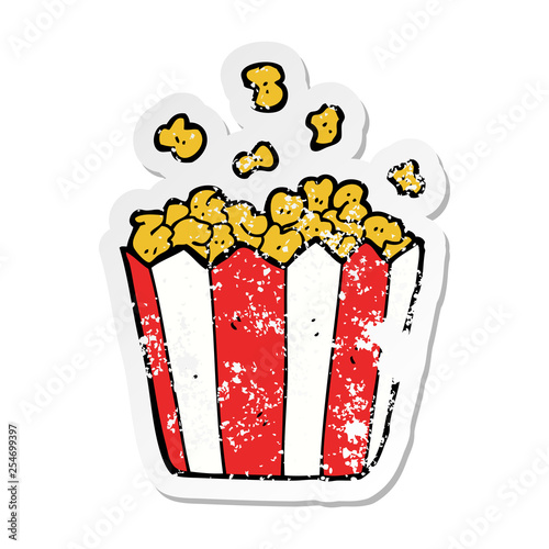 distressed sticker of a cartoon popcorn