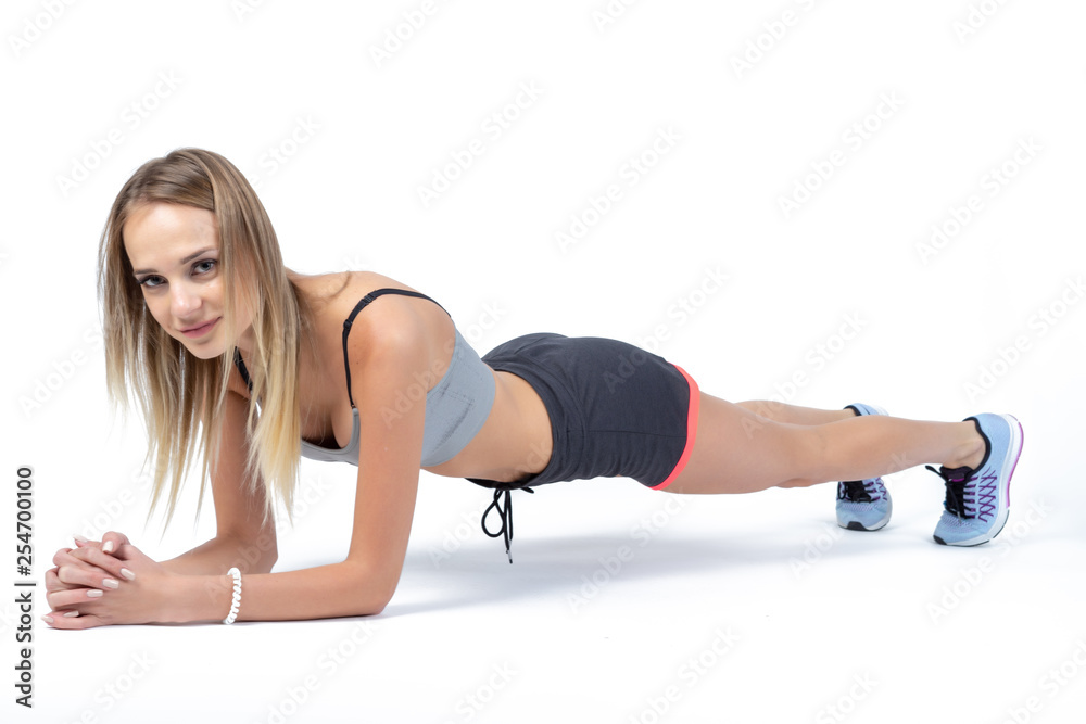 Sports girl in the studio. The girl is engaged in choreography Sports girl in the studio. The girl is engaged in choreography
