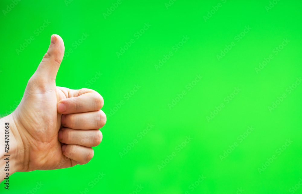 Male hand showing thumbs up. Chroma key. Place for your advertisement.